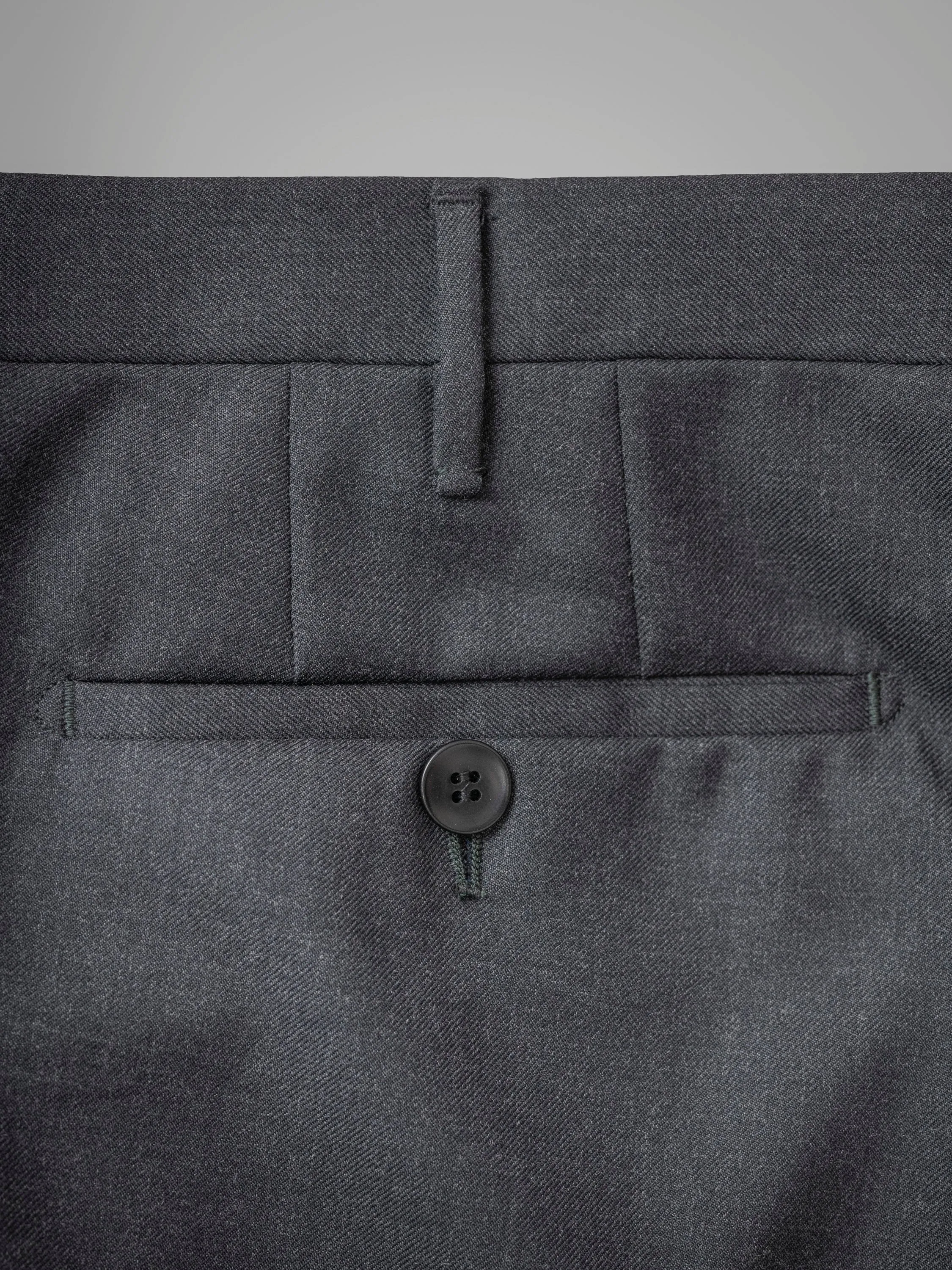 Dark grey pair of regular fit worsted wool trousers